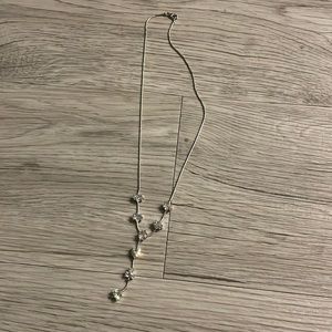 Diamond necklace with heart, spades, and diamonds